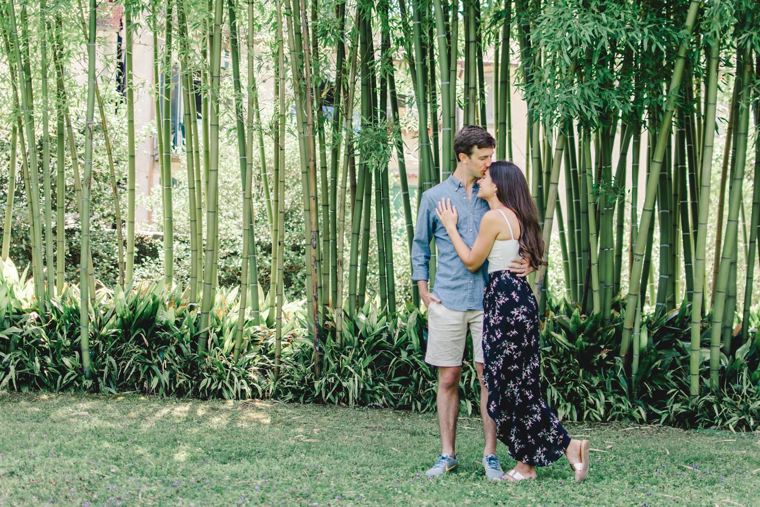 Couple photoshoot in front of bamboo trees in Italy