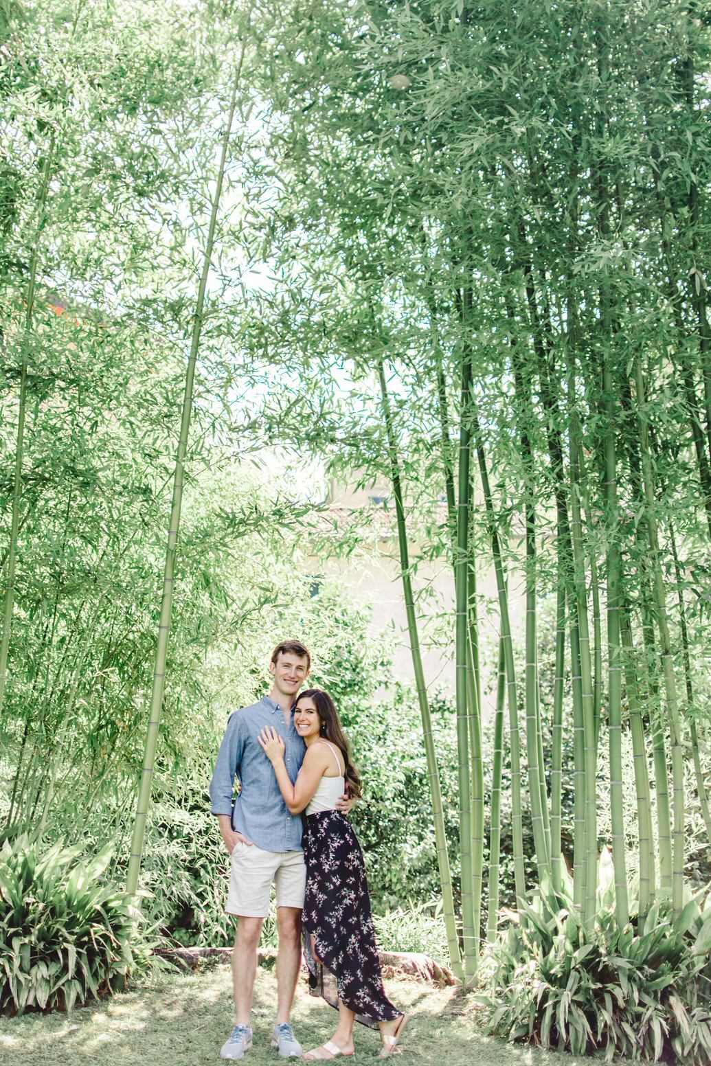 Couple portrait in front of bamboo