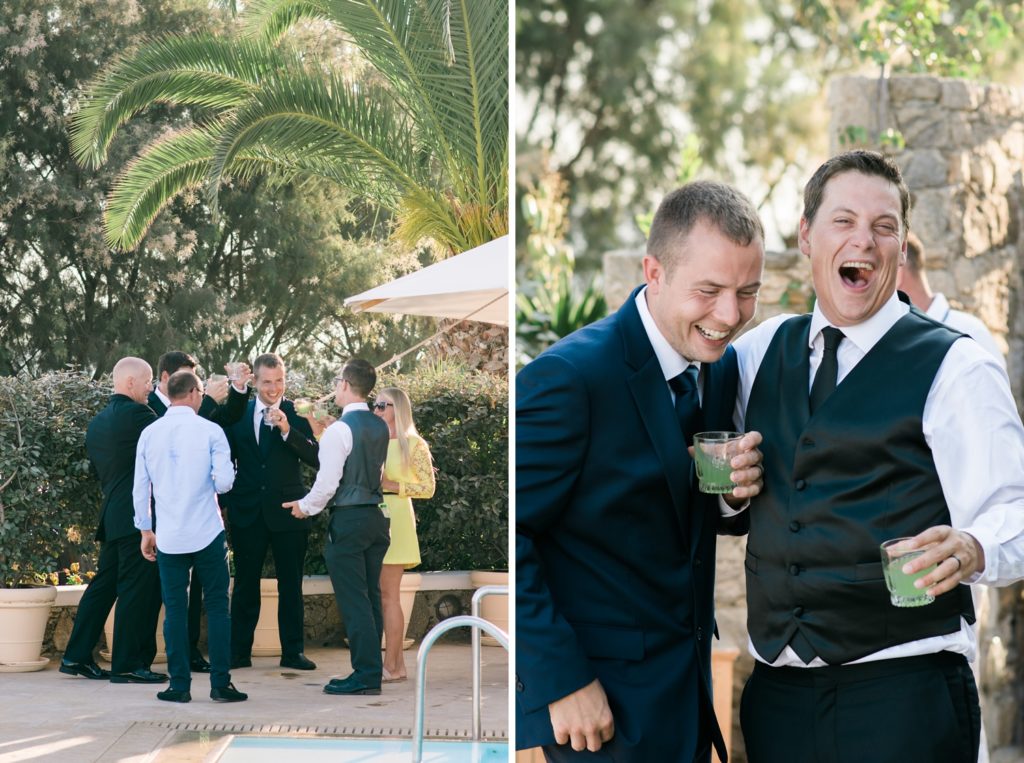 Wedding guests having fun at cocktail hour on Greek island wedding