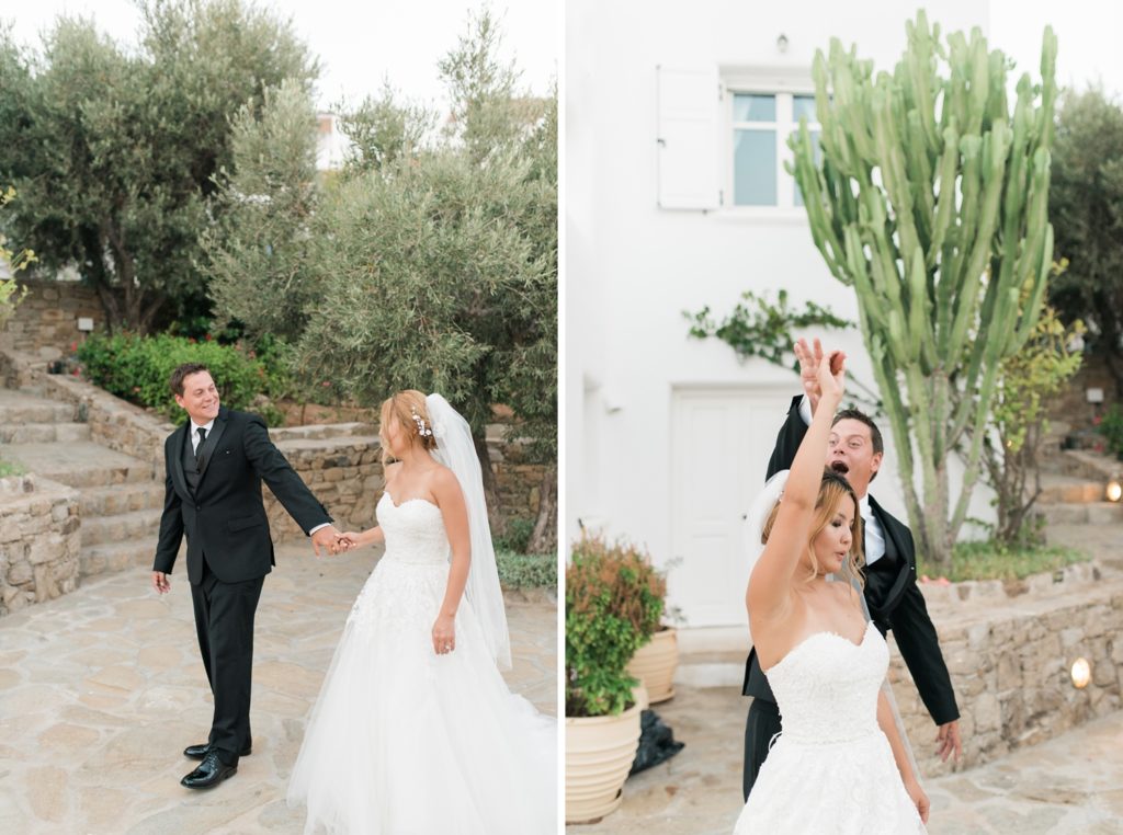 Bride and groom dancing in front of private luxury villa in Greece