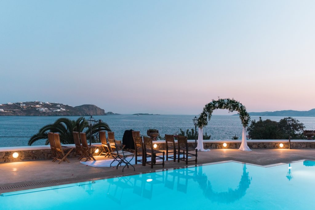 Beautiful sunset view from the swimming pool of a private vila in Greece
