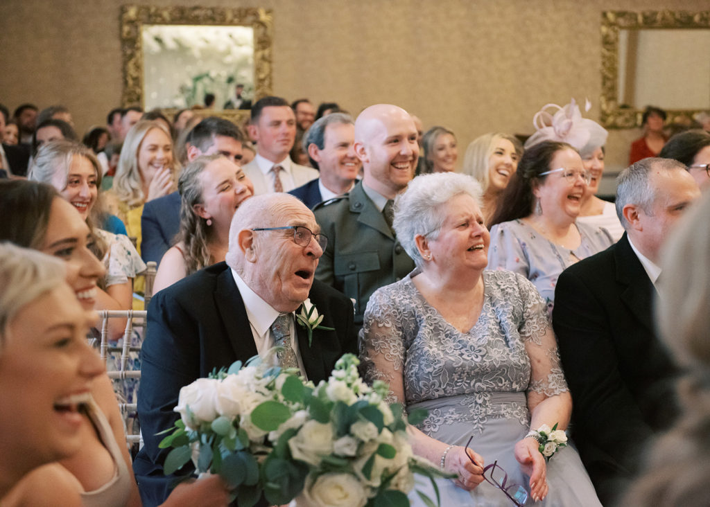 Grandparents witnessing the marriage of their grandchild.