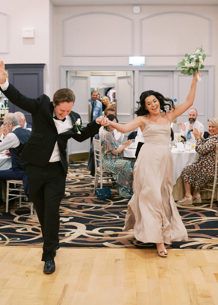 Wedding party's dramatic entrance gets a big cheer!