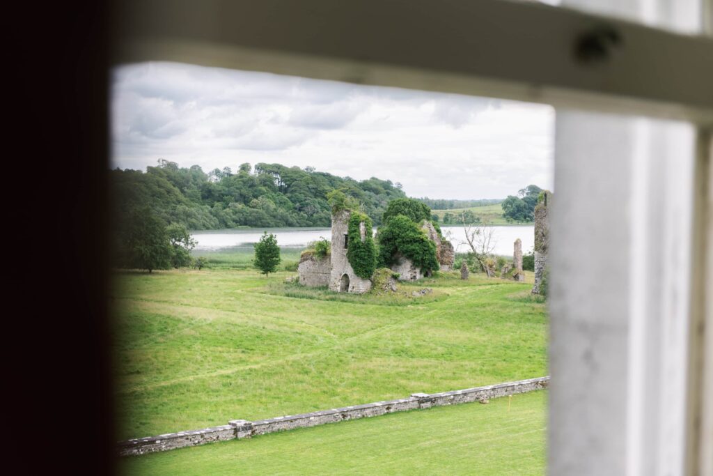 Eloping in Sligo: View of the castle ruin from the window of Temple House, with the beautiful Sligo countryside beyond.