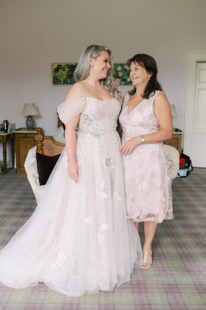 Lovely portrait of the bride and her proud mother on the morning of her elopement wedding.