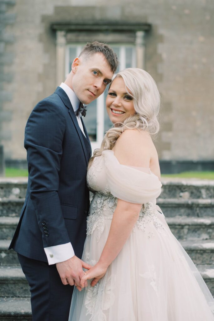 Outdoor elopement portrait of bride and groom in the gardens of Temple House.