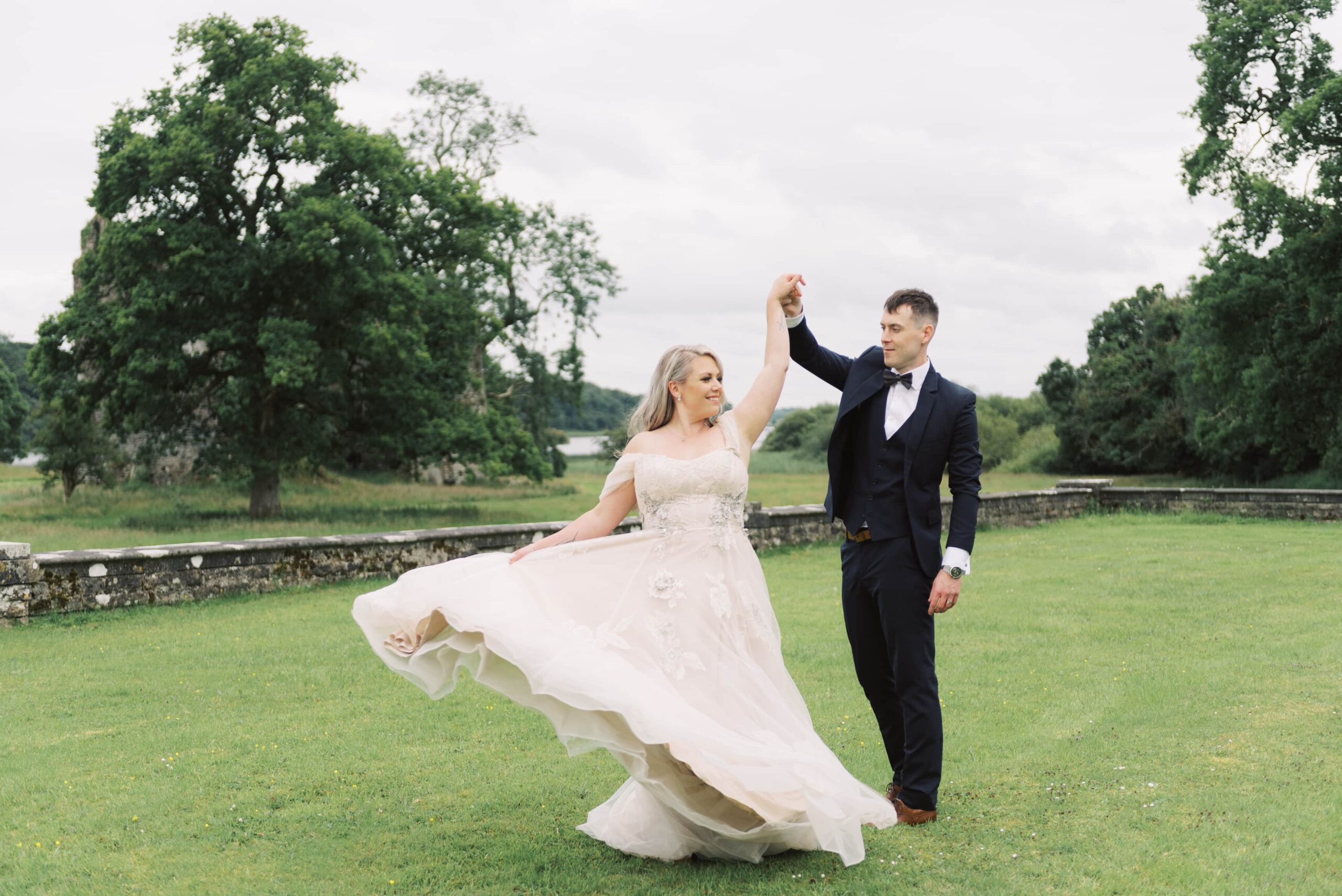 The eloping Bride and Groom share a dance and a twirl in the garden outside Temple House.