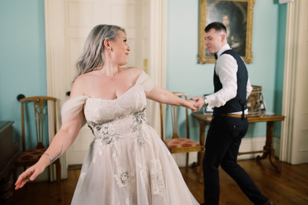 The newlywed couple turn out to be expert dancers and enjoy the entire foyer of Temple House for themselves.