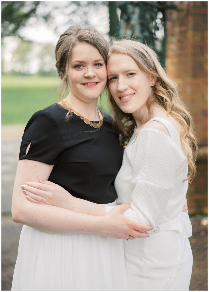 Same-sex wedding photography of two brides at Tankardstown House's Walled Garden.