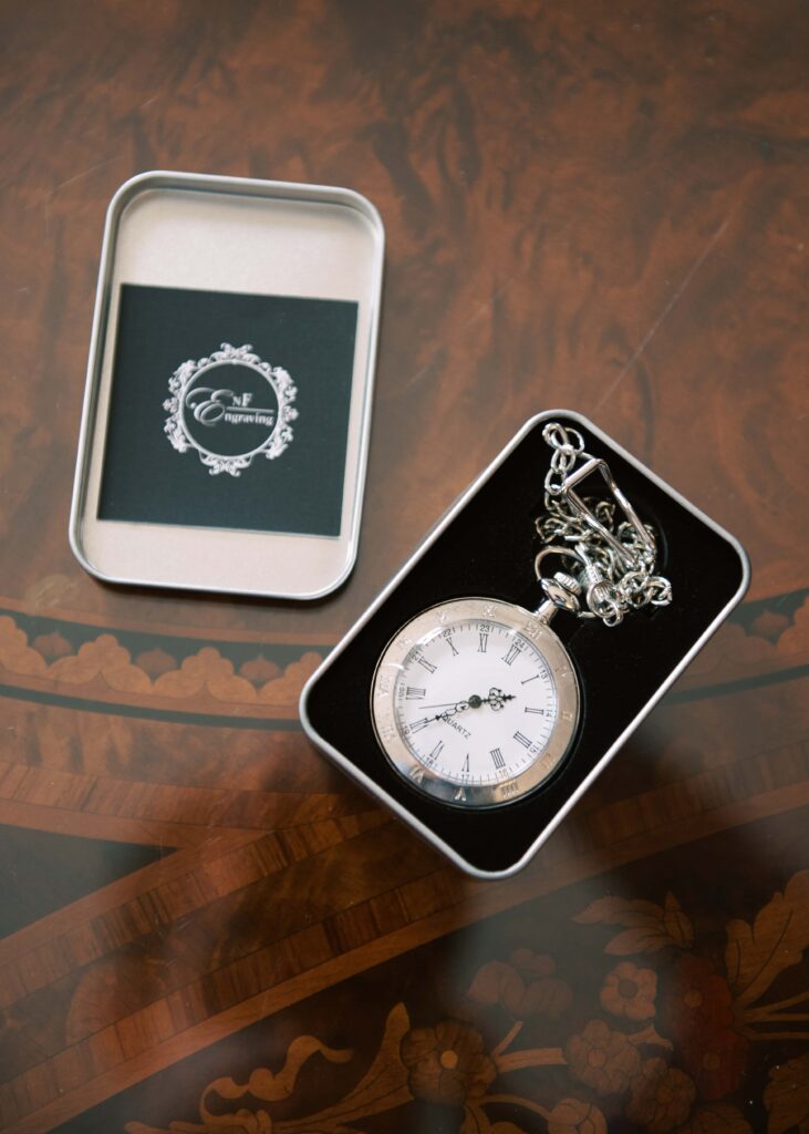 Detail of Groom's special pocket watch gift on the morning of his wedding.