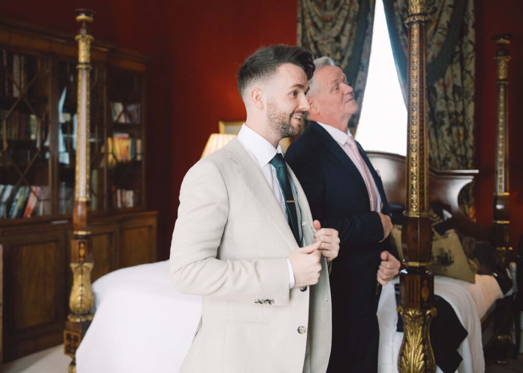 Father and son prepare together on the morning of the son's autumn wedding in Tankardstown House.